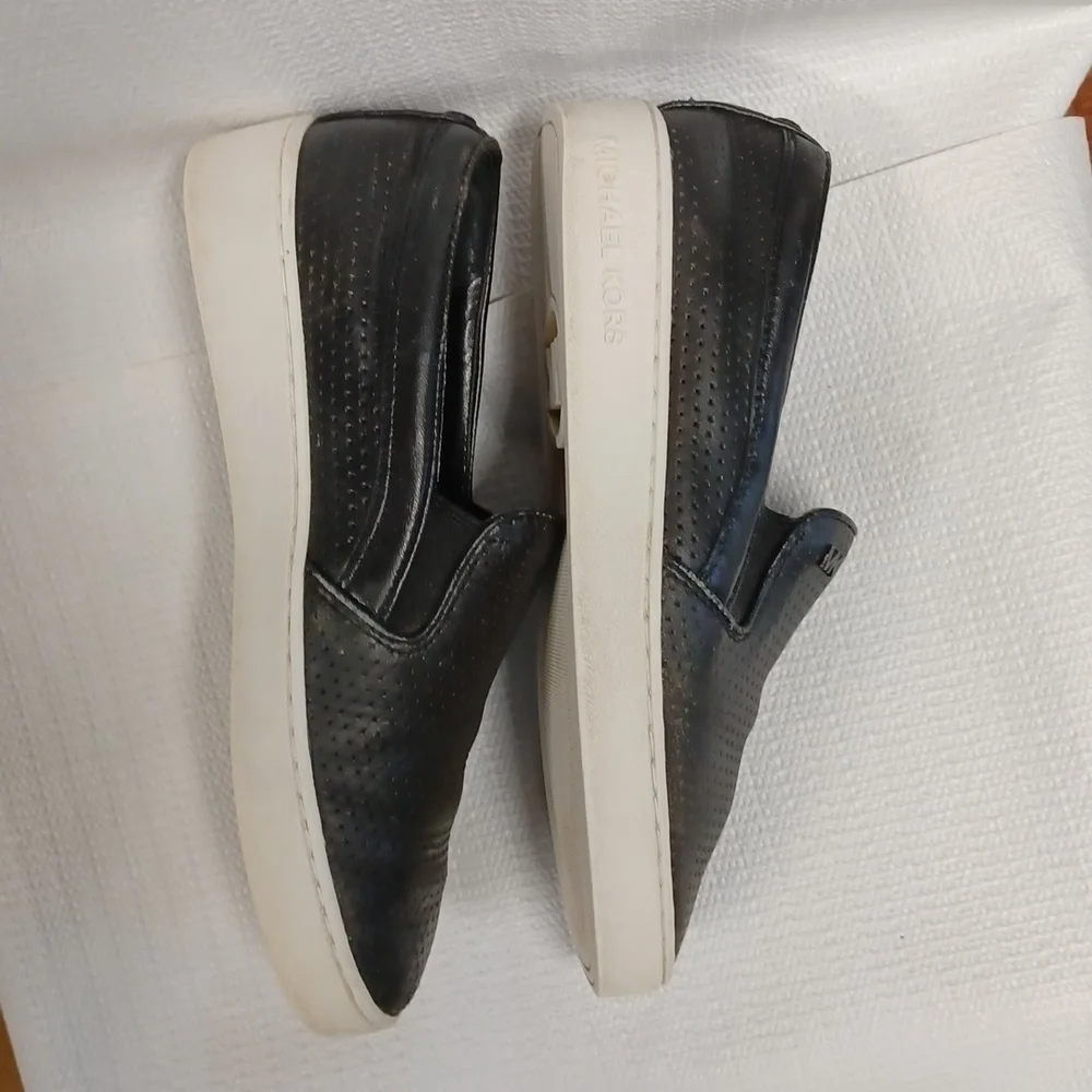 Michael Kors slip-on perforated black leather S 5M great condition